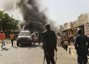 People gather to help at the scene of a bomb explosion in Gombe February 2, 2015.   . REUTERS/Afolabi Sotunde