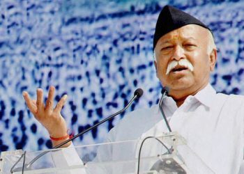 Ghaziabad: RSS Chief Mohan Bhagwat addresses the sangh workers during a function in Ghaziabad on Sunday. PTI Photo (PTI2_8_2015_000063A)