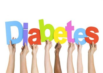 Multi-Ethnic Group Of Diverse People Holding Letters That Form Diabetes