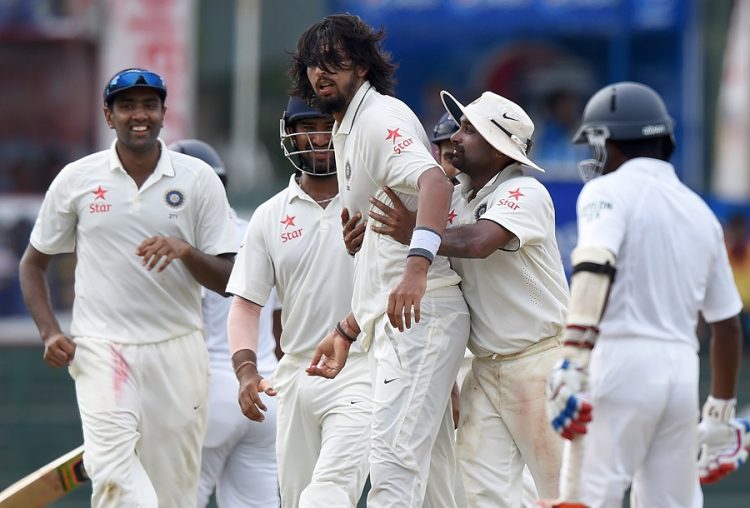 Indian cricketer Ishant Sharma (C) celebrates with teammates after dismissing Sri Lankan cricketer Dinesh Chandimal during the fourth day of their third and final Test cricket match between Sri Lanka and India at the Sinhalese Sports Club (SSC) in Colombo on August 31, 2015. AFP PHOTO / Ishara S. KODIKARA        (Photo credit should read Ishara S.KODIKARA/AFP/Getty Images)