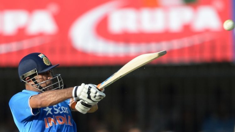 India's captain Mahendra Singh Dhoni plays a shot during the second one day international (ODI) cricket match between India and South Africa at The Holkar Cricket Stadium at Indore on October 14, 2015. AFP PHOTO/ INDRANIL MUKHERJEE ----IMAGE RESTRICTED TO EDITORIAL USE - STRICTLY NO COMMERCIAL USE---        (Photo credit should read INDRANIL MUKHERJEE/AFP/Getty Images)