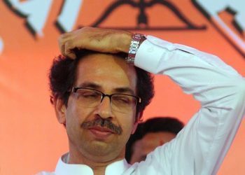 PIC/ BIPIN KOKATE- on 16/01/2014 Caption: Shiv Sena Chief Uddhav Thackeray with his son Yuva Sena president Aditya Thackeray. The Thackeray's addressed shiv shainiks during first Yuva Sena State Conference held at  Alibaug / Alibag in Raigad district.