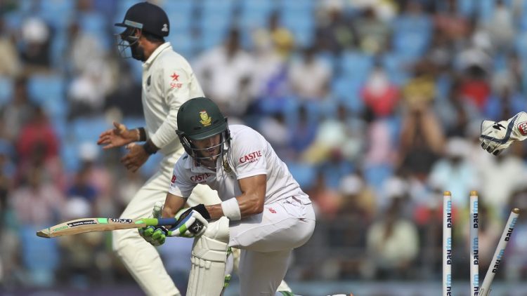 South African batsman Faf du Plessis looks back at his shattered stumps as he is bowled out by Indian spinner Amit Mishra, on the third day of the third cricket test match between the two countries in Nagpur, India, Friday, Nov. 27, 2015. (AP Photo/Rafiq Maqbool)