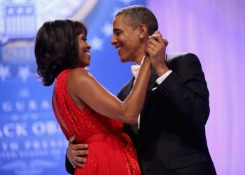 WASHINGTON, DC - JANUARY 21:  U.S. President Barack Obama and first lady Michelle Obama dance together during the Comander-in-Chief's Inaugural Ball at the Walter Washington Convention Center January 21, 2013 in Washington, DC. Obama was sworn-in for his second term of office earlier in the day.  (Photo by Chip Somodevilla/Getty Images)