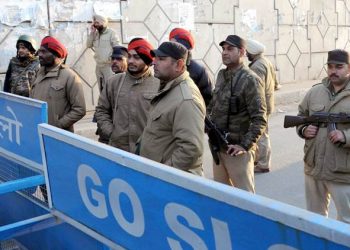 CAPTION-
Security personnel checking at road near the IAF base which was attacked by militants in Pathankot on Sunday, January 3 2016. EXPRESS PHOTO BY RANA SIMRANJIT SINGH