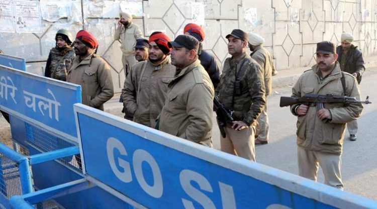 CAPTION-
Security personnel checking at road near the IAF base which was attacked by militants in Pathankot on Sunday, January 3 2016. EXPRESS PHOTO BY RANA SIMRANJIT SINGH