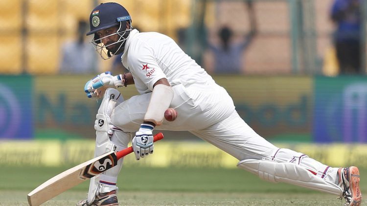 India's Cheteshwar Pujara plays a shot during the third day of their second test cricket match against Australia in Bangalore, India, Monday, March 6, 2017. (AP Photo/Aijaz Rahi)