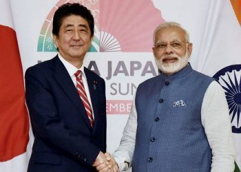 Gandhinagar: Prime Minister Narendra Modi with  his Japanese counterpart Shinzo Abe ahead of India- Japan annual summit at Mahatma Mandir, in Gandhinagar on Thursday. PTI Photo/pib(PTI9_14_2017_000048A)