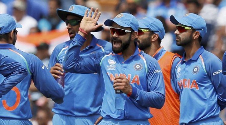 London : India's captain Virat Kohli, centre, celebrates his team taking the wicket of South Africa's Andile Phehlukwayo during the ICC Champions Trophy match between India and South Africa at The Oval cricket ground in London, Sunday, June 11, 2017. AP/PTI(AP6_11_2017_000172B)