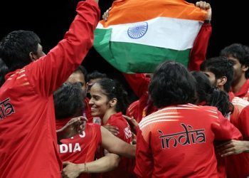 Badminton - Gold Coast 2018 Commonwealth Games - Mixed Team Medal Ceremony - Carrara Sports Arena 2 - Gold Coast, Australia - April 9, 2018. Team India celebrates winning a gold medal. REUTERS/Athit Perawongmetha