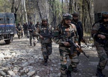 Indian army soldiers patrol near the site of a gunbattle with suspected rebels in Bungham village, northwest of Srinagar, Indian controlled Kashmir, Wednesday, Oct. 21, 2015. Indian government forces killed a suspected rebel in a gunbattle Wednesday in the disputed Himalayan region of Kashmir, officials said. (AP Photo/Dar Yasin)