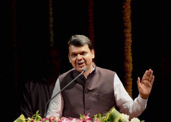 Navi Mumbai: Maharashtra CM Devendra Fadnavis speaks at the inauguration of Gram Vikas Bhavan at Kharghar in Navi Mumbai on Monday. PTI Photo (PTI1_2_2017_000078B)