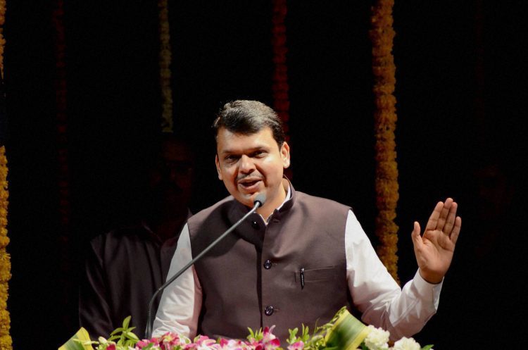 Navi Mumbai: Maharashtra CM Devendra Fadnavis speaks at the inauguration of Gram Vikas Bhavan at Kharghar in Navi Mumbai on Monday. PTI Photo (PTI1_2_2017_000078B)