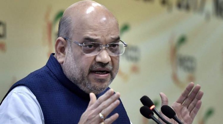 New Delhi: BJP National President Amit Shah addressing at an interactive session with FICCI in New Delhi on Saturday. PTI Photo by Vijay Verma (PTI9_9_2017_000039B)