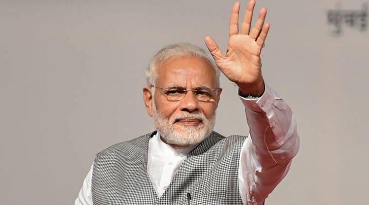 Mumbai: Prime Minister Narendra Modi waves during a BJP function, in Mumbai on Tuesday, June 26, 2018. (PTI Photo/Mitesh Bhuvad) (PTI6_26_2018_000136A)