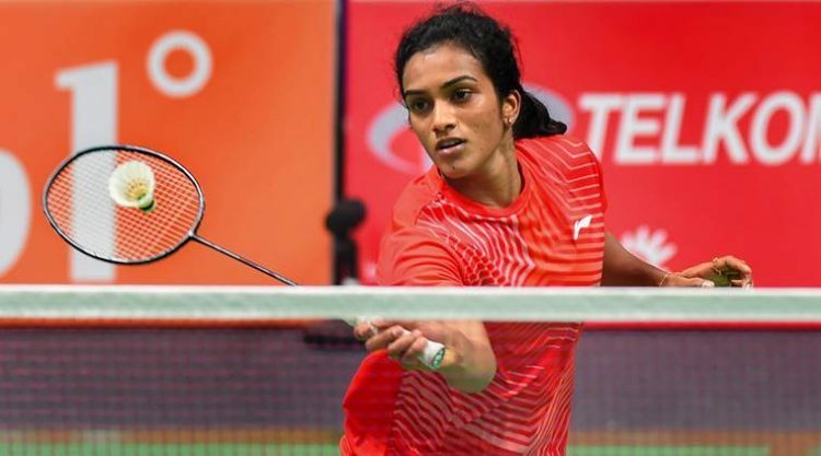Jakarta: Indian shuttler PV Sindhu in action against Vu Thi Trang of Vietnam in the women's  singles badminton match at 18th Asian Games 2018, in Jakarta, on Thursday, Aug 23, 2018. (PTI Photo/Shahbaz Khan) (PTI8_23_2018_000079A)