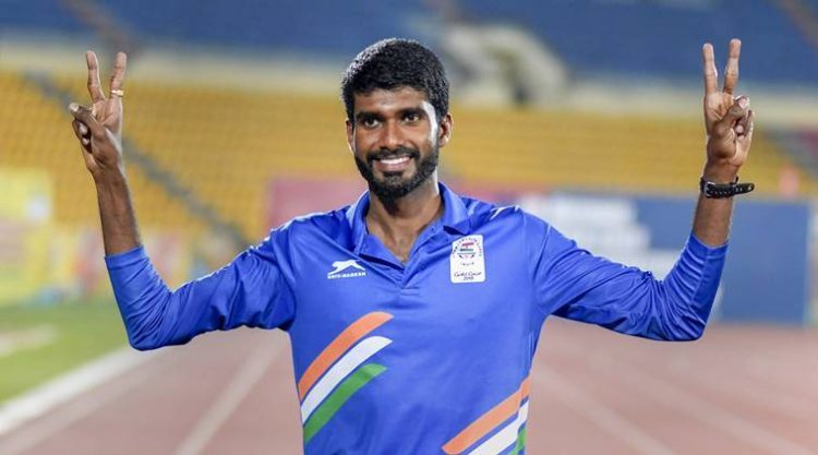 Guwahati: Keralas Jinson Johnson celebrates after creating a national record in the men's 800m run during the 58th National Inter-State Senior Athletic Championships 2018 at Indira Gandhi Athletic Stadium, in Guwahati on Wednesday, June 27, 2018. (PTI Photo)(PTI6_27_2018_000272B)