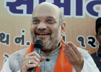 Vadodara: BJP president Amit Shah speaks during his visit to Davadiya village in Vadodara district on Wednesday.PTI Photo(PTI5_31_2017_000076B)