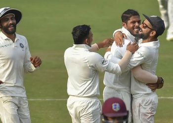 Hyderabad: Indian bowler Umesh Yadav celebrates with the teammates after dismissing the last West Indies batsman Hannon Gabriel on Day 3 of the second cricket test match, in Hyderabad, Sunday, Oct 14, 2018.  (PTI Photo/Kamal Kishore)   (PTI10_14_2018_000076A) *** Local Caption ***