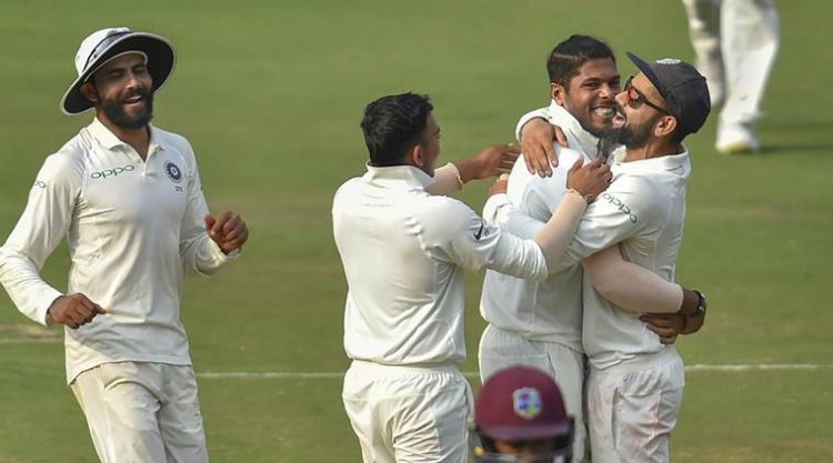 Hyderabad: Indian bowler Umesh Yadav celebrates with the teammates after dismissing the last West Indies batsman Hannon Gabriel on Day 3 of the second cricket test match, in Hyderabad, Sunday, Oct 14, 2018.  (PTI Photo/Kamal Kishore)   (PTI10_14_2018_000076A) *** Local Caption ***