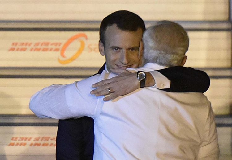 NEW DELHI, INDIA - MARCH 9: Prime Minister Narendra Modi welcomes French President Emmanuel Macron and his wife Brigitte Macron at AFS Palam on March 9, 2018 in New Delhi, India.  The visit is also aimed at strengthening the bilateral economic, political and strategic dimension of our engagement, the MEA said in a statement. The last visit of the French President to India was in January 2016, when Macron was the chief guest at the Republic Day celebrations. Prime Minister Modi had last visited France in June last year. (Photo by Vipin Kumar/Hindustan Times via Getty Images)