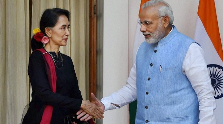 New Delhi: Prime Minister Narendra Modi shakes hands with Myanmar State Counsellor and Foreign Minister Aung San Suu Kyi at Hyderabad House in New Delhi on Wednesday. PTI Photo by Manvender Vashist(PTI10_19_2016_000054B)
