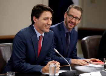 FILE PHOTO: Canada's Prime Minister Justin Trudeau (L) and his principal secretary Gerald Butts take part in a meeting with Italy's Prime Minister Paolo Gentiloni (not pictured) on Parliament Hill in Ottawa, Ontario, Canada, April 21, 2017. REUTERS/Chris Wattie