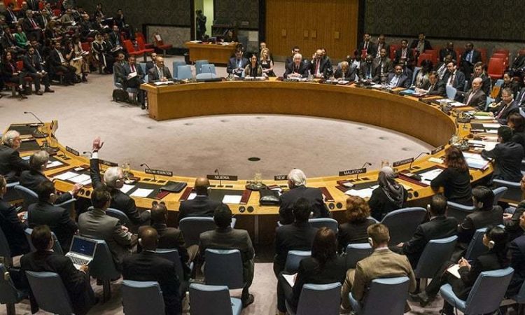 The Russian ambassador to the United Nations Vitaly Churkin abstains from a vote in the United Nations Security Council attempting to halt the escalating conflict in Yemen in New York April 14, 2015. The United Nations Security Council on Tuesday imposed an arms embargo targeting the Iran-allied Houthi rebels who rule most of the country and blacklisted the son of Yemen's former president and a Houthi leader after veto-power Russia abstained.  REUTERS/Lucas Jackson      TPX IMAGES OF THE DAY
