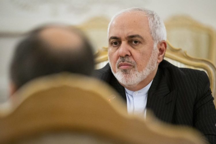 Iranian Foreign Minister Mohammad Javad Zarif listens to Russian Foreign Minister Sergey Lavrov during their talks in Moscow, Russia, Monday, Dec. 30, 2019. (AP Photo/Alexander Zemlianichenko)