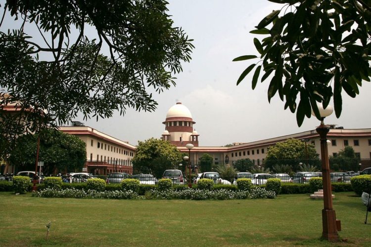 View Of Indian Supreme court main building from the supreme court lawn In New Delhi .