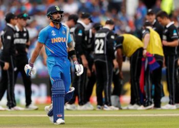 Cricket - ICC Cricket World Cup Semi Final - India v New Zealand - Old Trafford, Manchester, Britain - July 10, 2019   India's Virat Kohli reacts after losing his wicket   Action Images via Reuters/Lee Smith