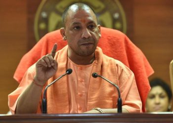 Lucknow: Uttar Pradesh Chief Minister Yogi Adityanath addresses a press conference in Lucknow on Aug 12, 2017. (Photo: IANS)