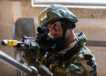 An Indian Soldier holds his position and covers his arcs during a building clearance Today (17/02/20) on Salisbury Plain, during a join exercise with 1st Battalion the Rifles.

A composite company of soldiers from the 14th Battalion The Dogra Regiment have arrived in the UK to participate in the joint Indian and British Army exercise; Exercise Ajeya Warrior.

Exercise Ajeya Warrior is held biannually in alternate countries and this year itÕs the UK turn to host this prestigious training event.
The two-week exercise is being held on Salisbury Plain and will see B Company, 1st Battalion The Rifles host soldiers of the 14th Battalion The Dogra Regiment. An opening ceremony to welcome the Indian contingent was held at Westdown Camp, Salisbury Plain.The aim of the exercise is to pool together ideas, enhance interoperability and developing army-to-army links.
It will see troops from both sides working together in mixed companies on challenging scenarios, which test their abilities and stamina. They will participate in a series of familiarisation stands, lectures and physical training activities. From getting to know one anotherÕs kit and equipment, to understanding each otherÕs experiences and tactics on operations, the exercise will provide an excellent platform to learn from each other. It will culminate with a 72-hours joint exercise.

Photographer:
Corporal Rob Kane / MoD Crown