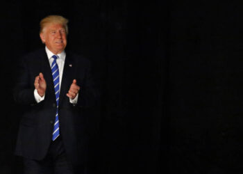 DALLAS, TX - JUNE 16: Republican presidential candidate Donald Trump arrives on stage June 16, 2016 at Gilley's in Dallas, Texas. Trump arrived in Texas on Thursday with plans to hold rallies and fundraisers. (Photo by Ron Jenkins/Getty Images)