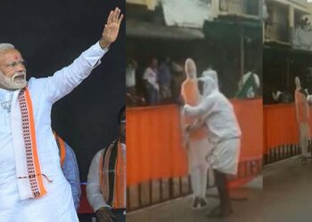 ”മോദിജി എനിക്ക് ദൈവത്തെപ്പോലെ;” മഴയത്ത് നനഞ്ഞ കട്ടൗട്ടിൽ നിന്ന് വെള്ളം തുടച്ചുമാറ്റുന്ന വീഡിയോ ശ്രദ്ധനേടുന്നു