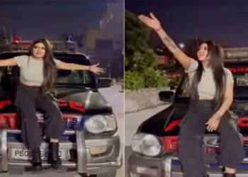 ഇൻസ്റ്റഗ്രാം റീലിന് വേണ്ടി പോലീസ് വാഹനത്തിന്റെ ബോണറ്റിൽ കയറിയിരുന്ന് നൃത്തം ചെയ്ത് യുവതി; അനുമതി നൽകിയ പോലീസ് ഉദ്യോഗസ്ഥന് സസ്‌പെൻഷൻ