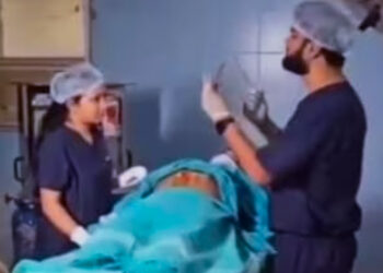 ഓപ്പറേഷൻ തീയേറ്ററിനുള്ളിൽ സേവ് ദി ഡേറ്റ് വീഡിയോ ചിത്രീകരിച്ച് ഡോക്ടർ ; ജോലിയിൽ നിന്നും പിരിച്ചുവിട്ട് സർക്കാർ