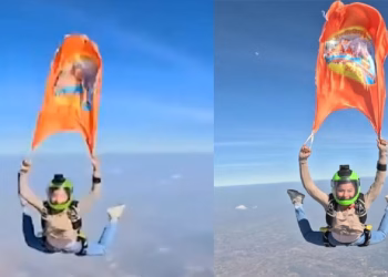 ബാങ്കോക്കിന്റെ ആകാശത്ത് 13,000 അടി ഉയരത്തിൽ പാറിപ്പറന്ന് പതാക; മഹാകുംഭമേളയുടെ വരവ് ലോകത്തെ അറിയിച്ച് അനാമിക