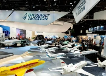 Display models of Dassault Aviation SA aircraft, including Falcon firefighter, left, and executive jets at the Paris Air Show in Paris, France, on Monday, June 16, 2025. The 55th Paris Air Show runs 16-20 June at Le Bourget airport. Photographer: Nathan Laine/Bloomberg